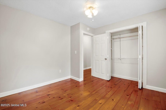 61 Lemaire Way, Argyle, NY 12809 - unfurnished bedroom with hardwood / wood-style flooring and a closet