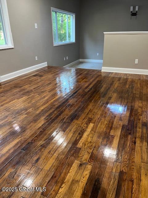 5 Hillandale Dr, Charlton, NY 12019 - unfurnished room with plenty of natural light and dark wood finished floors