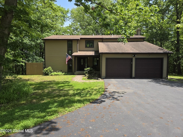 251 Vernon Rd, Glenville, NY 12302 - view of front of property with an attached garage, asphalt driveway, and a chimney