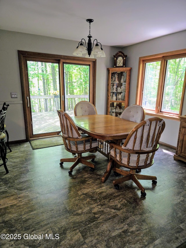 251 Vernon Rd, Glenville, NY 12302 - dining room featuring a chandelier and baseboards