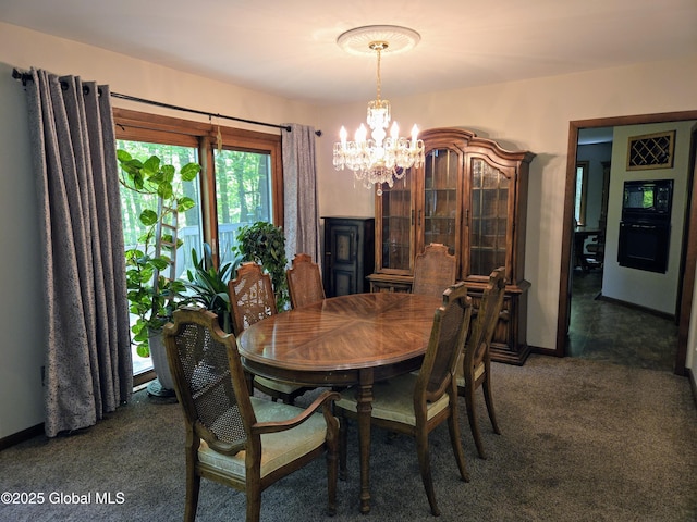 251 Vernon Rd, Glenville, NY 12302 - carpeted dining space featuring a chandelier and baseboards