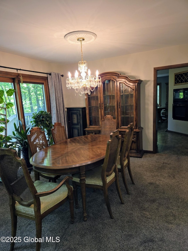 251 Vernon Rd, Glenville, NY 12302 - dining area featuring a chandelier and carpet flooring