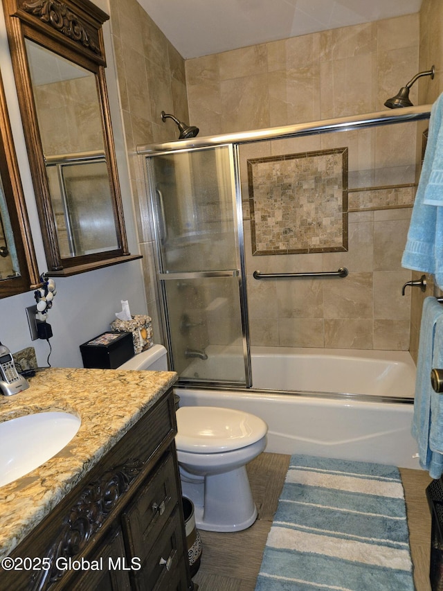 251 Vernon Rd, Glenville, NY 12302 - bathroom with vanity, toilet, bath / shower combo with glass door, and tile patterned floors