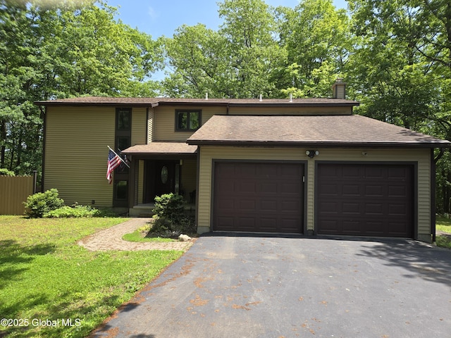 251 Vernon Rd, Glenville, NY 12302 - mid-century modern home with an attached garage, driveway, a chimney, a front yard, and roof with shingles