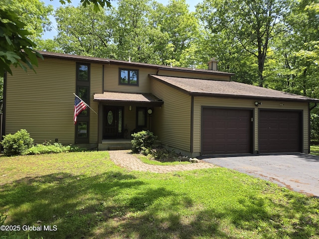 251 Vernon Rd, Glenville, NY 12302 - mid-century modern home featuring an attached garage, asphalt driveway, a front yard, and a chimney