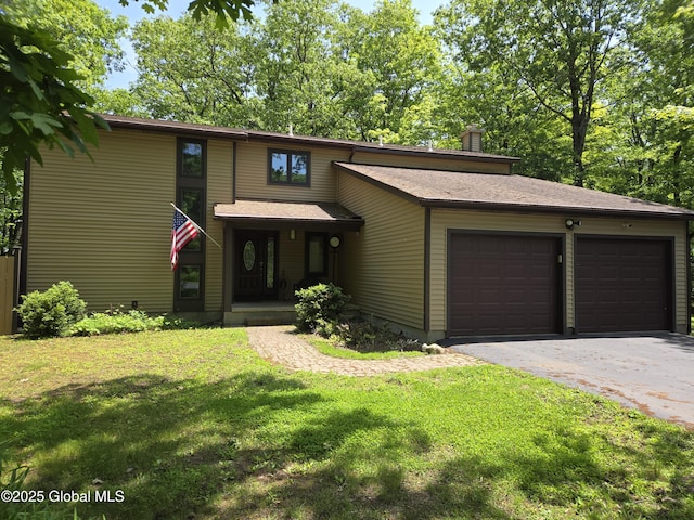 251 Vernon Rd, Glenville, NY 12302 - mid-century inspired home featuring an attached garage, driveway, a front lawn, and a chimney