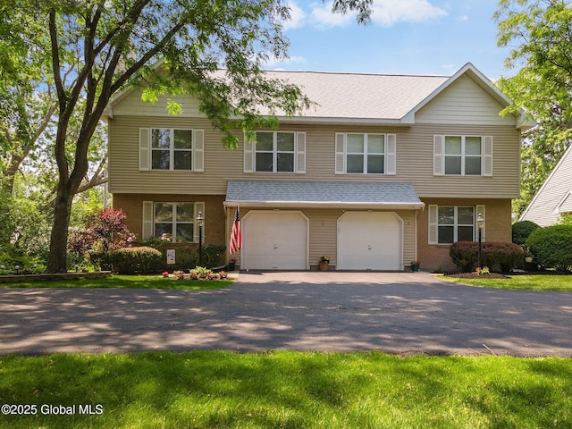 1401 Balltown Rd, Niskayuna, NY 12309 - view of front of house featuring driveway, an attached garage, a shingled roof, and brick siding