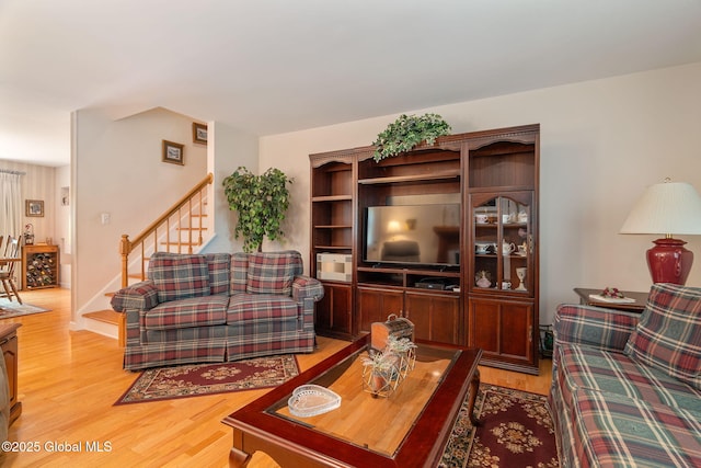 1401 Balltown Rd, Niskayuna, NY 12309 - living area featuring light wood-style flooring and stairs