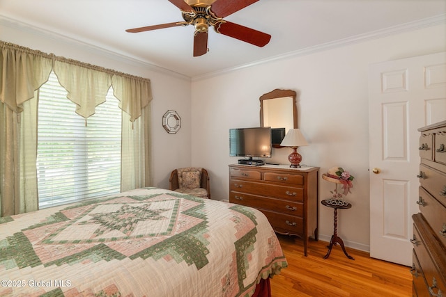 1401 Balltown Rd, Niskayuna, NY 12309 - bedroom with ornamental molding, light wood-style floors, a ceiling fan, and baseboards