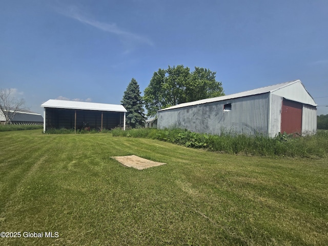 1056 Carlisle Rd, Root, NY 13317 - view of grassy yard with an outbuilding