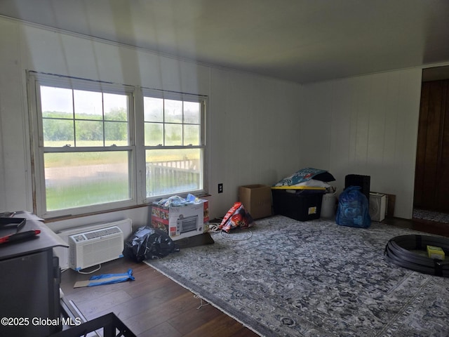 1056 Carlisle Rd, Root, NY 13317 - game room featuring wood finished floors and a wall mounted air conditioner