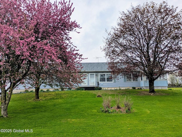 19 Cartier Ln, Fort Ann, NY 12827 - view of front of home featuring a front yard and a shingled roof