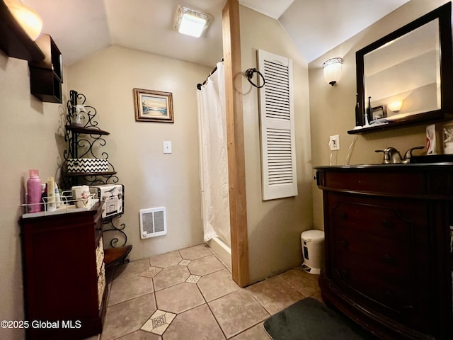 2803 Wellington Ave, Rotterdam, NY 12306 - bathroom with lofted ceiling, vanity, tile patterned flooring, and curtained shower