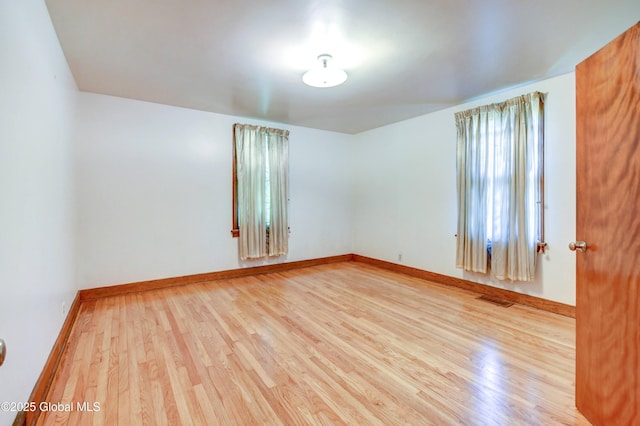 55 Crescent Ave, Amsterdam, NY 12010 - unfurnished room featuring wood finished floors and baseboards