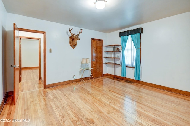 55 Crescent Ave, Amsterdam, NY 12010 - empty room featuring wood finished floors and baseboards
