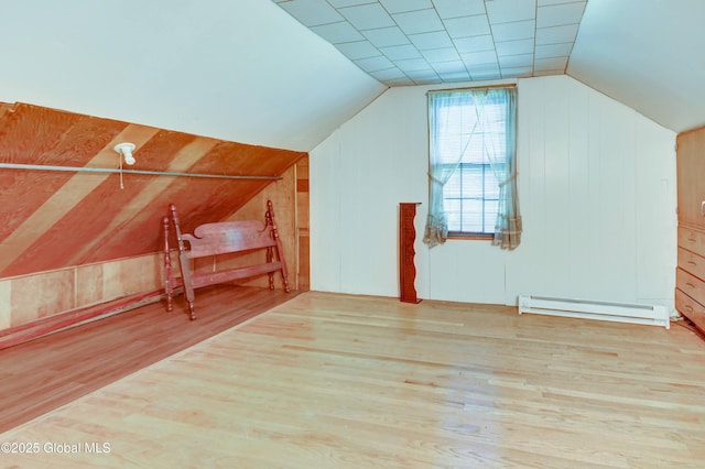 55 Crescent Ave, Amsterdam, NY 12010 - additional living space featuring a baseboard heating unit, wood finished floors, vaulted ceiling, and wood walls