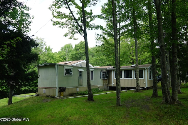 127 Fern Ln, Jefferson, NY 12093 - manufactured / mobile home featuring a front lawn