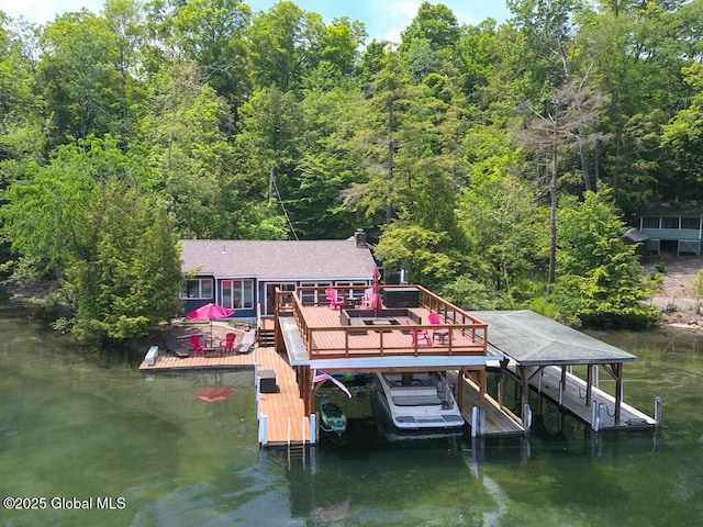 3602 Echo Bay Ln, Fort Ann, NY 12844 - dock area with a water view, boat lift, and a wooded view