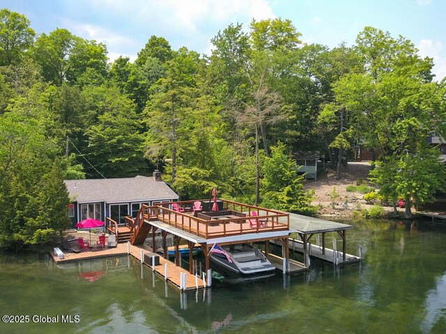 3602 Echo Bay Ln, Fort Ann, NY 12844 - dock area featuring a water view, a view of trees, and boat lift
