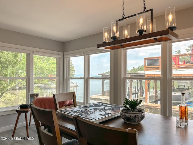 3602 Echo Bay Ln, Fort Ann, NY 12844 - dining space featuring a water view and plenty of natural light
