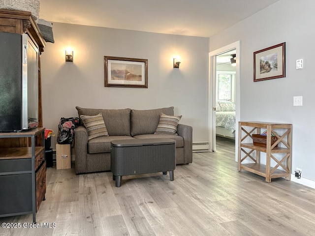 3602 Echo Bay Ln, Fort Ann, NY 12844 - living room with baseboard heating and light wood-style floors