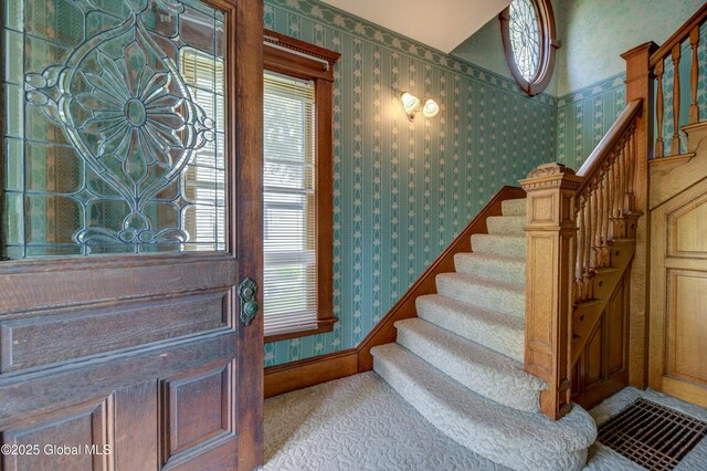510 S William St, Johnstown, NY 12095 - entrance foyer featuring wallpapered walls, stairway, and plenty of natural light