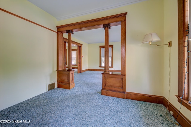510 S William St, Johnstown, NY 12095 - carpeted empty room featuring ornamental molding and baseboards