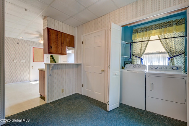 510 S William St, Johnstown, NY 12095 - washroom with wallpapered walls, washer and dryer, dark carpet, and ceiling fan