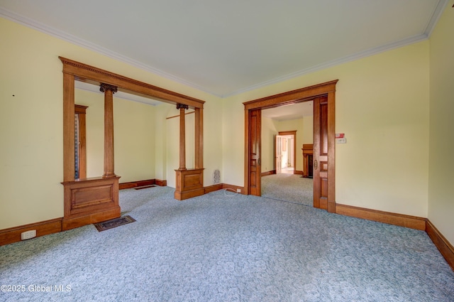 510 S William St, Johnstown, NY 12095 - spare room with ornamental molding and carpet
