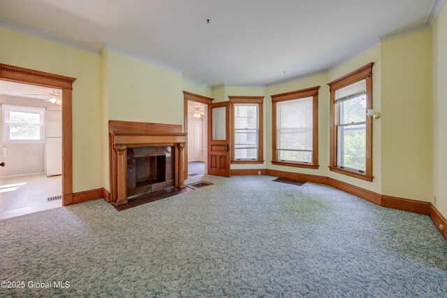 510 S William St, Johnstown, NY 12095 - unfurnished living room with carpet floors, a fireplace with flush hearth, and ornamental molding