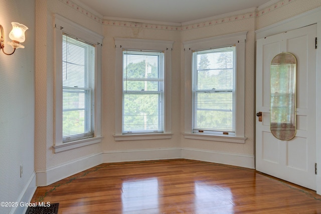 510 S William St, Johnstown, NY 12095 - unfurnished room with wood finished floors and ornamental molding