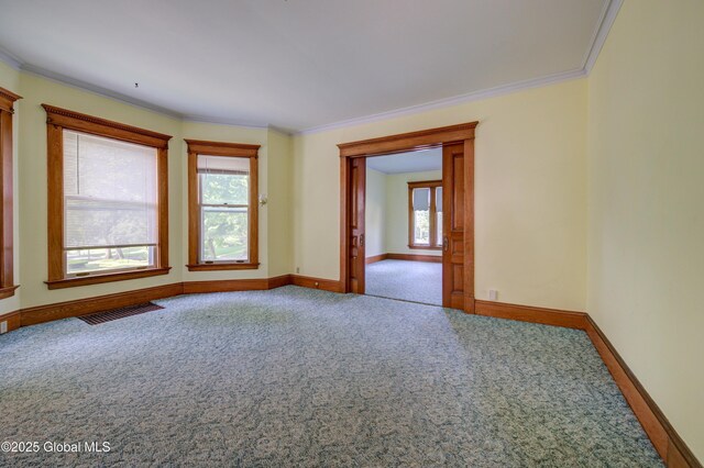 510 S William St, Johnstown, NY 12095 - carpeted empty room featuring crown molding