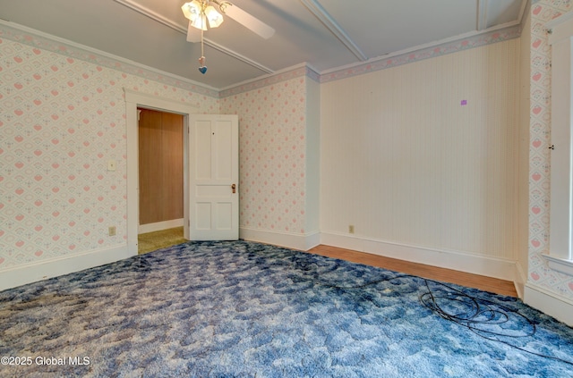510 S William St, Johnstown, NY 12095 - carpeted empty room featuring attic access, ceiling fan, wallpapered walls, and wood finished floors