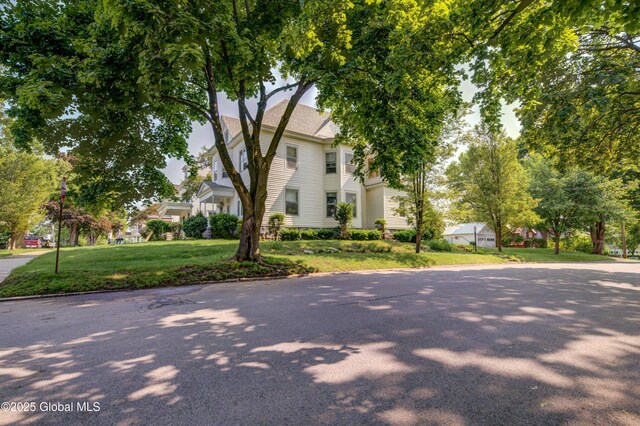 510 S William St, Johnstown, NY 12095 - view of front of property featuring a front yard