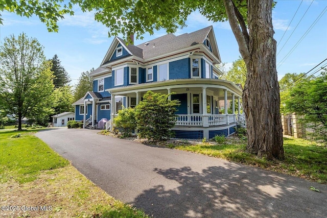 4 Van Dyke Ave, Amsterdam, NY 12010 - victorian home featuring covered porch and a chimney