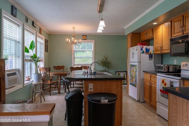 79 Chandler Ln, Greenfield, NY 12859 - kitchen featuring white appliances, a chandelier, dark countertops, cooling unit, and an island with sink