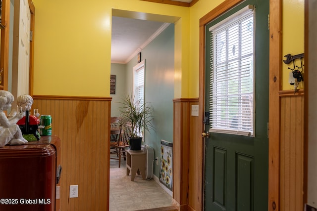 79 Chandler Ln, Greenfield, NY 12859 - entrance foyer with ornamental molding and a wainscoted wall