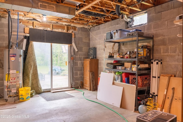 79 Chandler Ln, Greenfield, NY 12859 - below grade area featuring gas water heater and concrete block wall