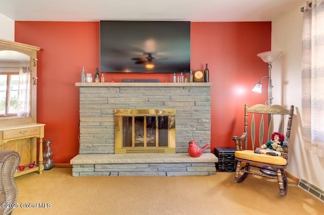 8 Birchtree Ln, Milton, NY 12020 - carpeted living area with a stone fireplace, a ceiling fan, and baseboards