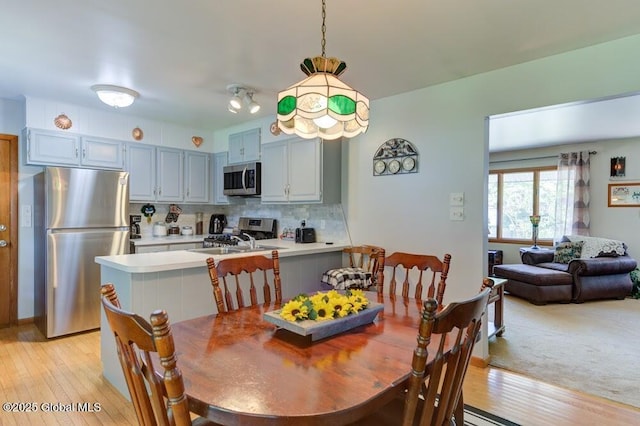 8 Birchtree Ln, Milton, NY 12020 - dining area with light wood-style flooring