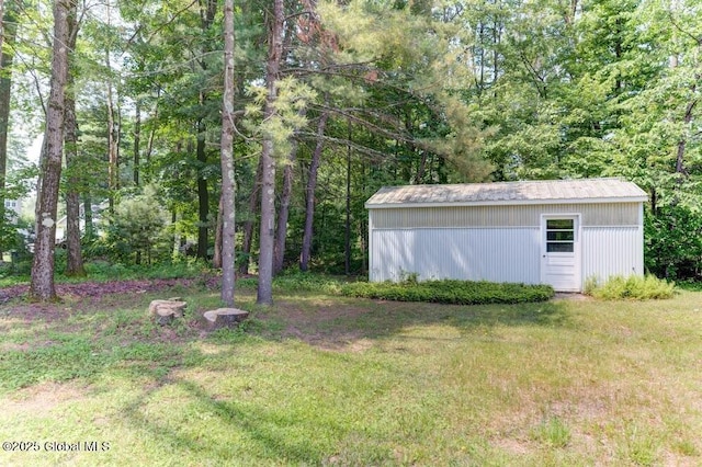 8 Birchtree Ln, Milton, NY 12020 - view of green lawn featuring an outbuilding and a wooded view