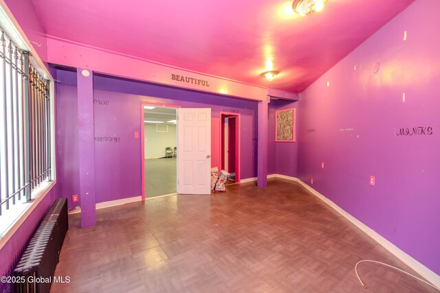 1374 10th Ave, Schenectady, NY 12303 - empty room with radiator heating unit and baseboards
