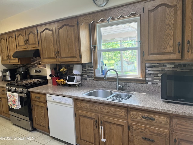 6 Pine Rd, Moreau, NY 12803 - kitchen featuring black microwave, white dishwasher, stainless steel range with gas cooktop, a sink, and backsplash