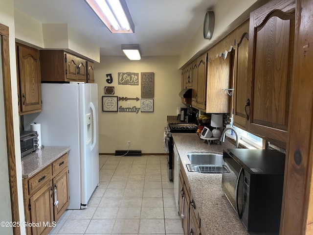 6 Pine Rd, Moreau, NY 12803 - kitchen with black microwave, a sink, stainless steel gas range, white refrigerator with ice dispenser, and baseboards