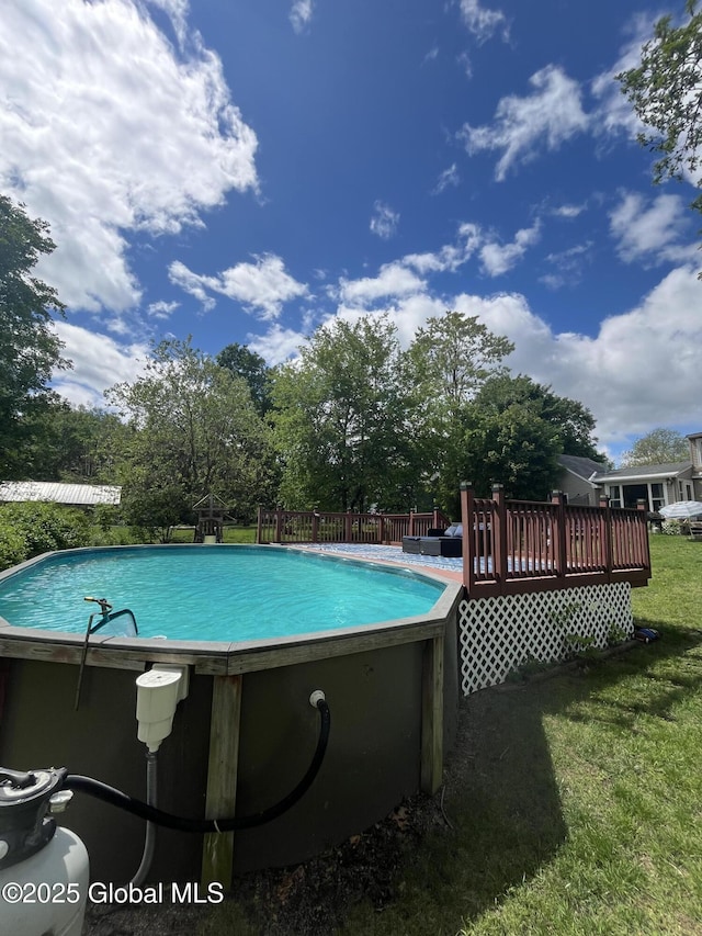 6 Pine Rd, Moreau, NY 12803 - outdoor pool featuring a deck and a lawn