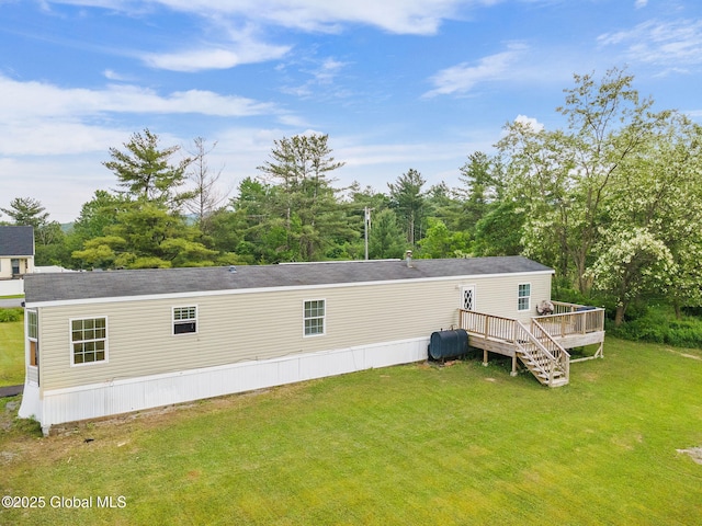 131 Abrams Rd, Wright, NY 12023 - back of house featuring a deck, a yard, and heating fuel