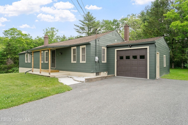 16 Smith Ln, East Greenbush, NY 12144 - single story home featuring a chimney, an attached garage, asphalt driveway, and a front lawn