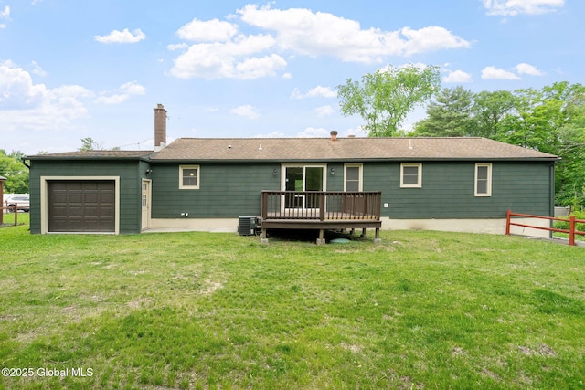 16 Smith Ln, East Greenbush, NY 12144 - rear view of house with a garage, a wooden deck, a chimney, and cooling unit