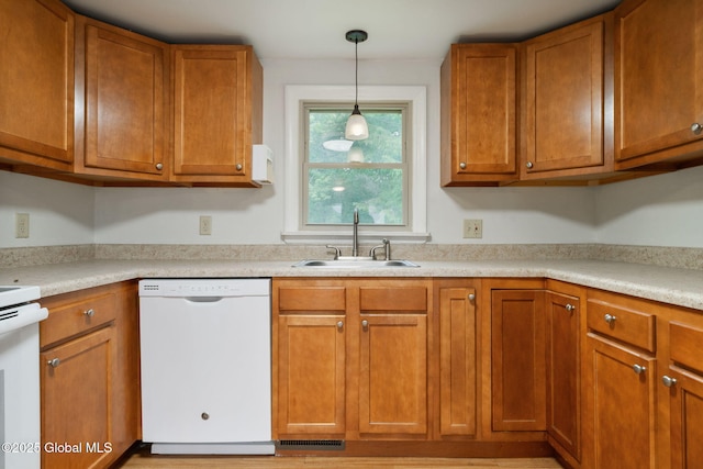 16 Smith Ln, East Greenbush, NY 12144 - kitchen featuring white dishwasher, a sink, brown cabinets, and light countertops