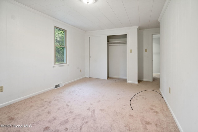 16 Smith Ln, East Greenbush, NY 12144 - unfurnished bedroom with ornamental molding, carpet flooring, and a closet